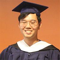 Headshot of Kenan Gu wearing graduate academic regalia